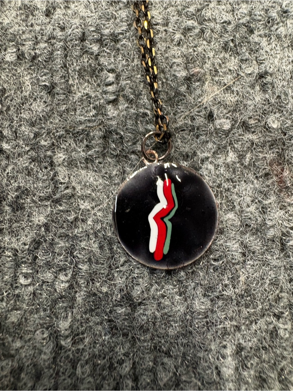 Hand Crafted Black Pendant Necklace with Red White and Green Stripes